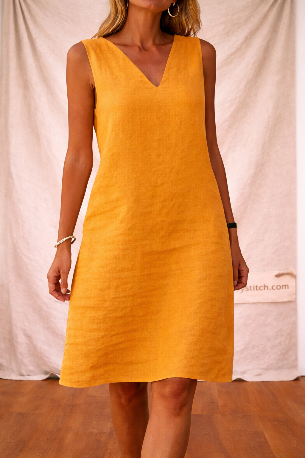 Sleeveless Mini Dress with V-Neck and Textured Fabric – Relaxed Flowy Fit